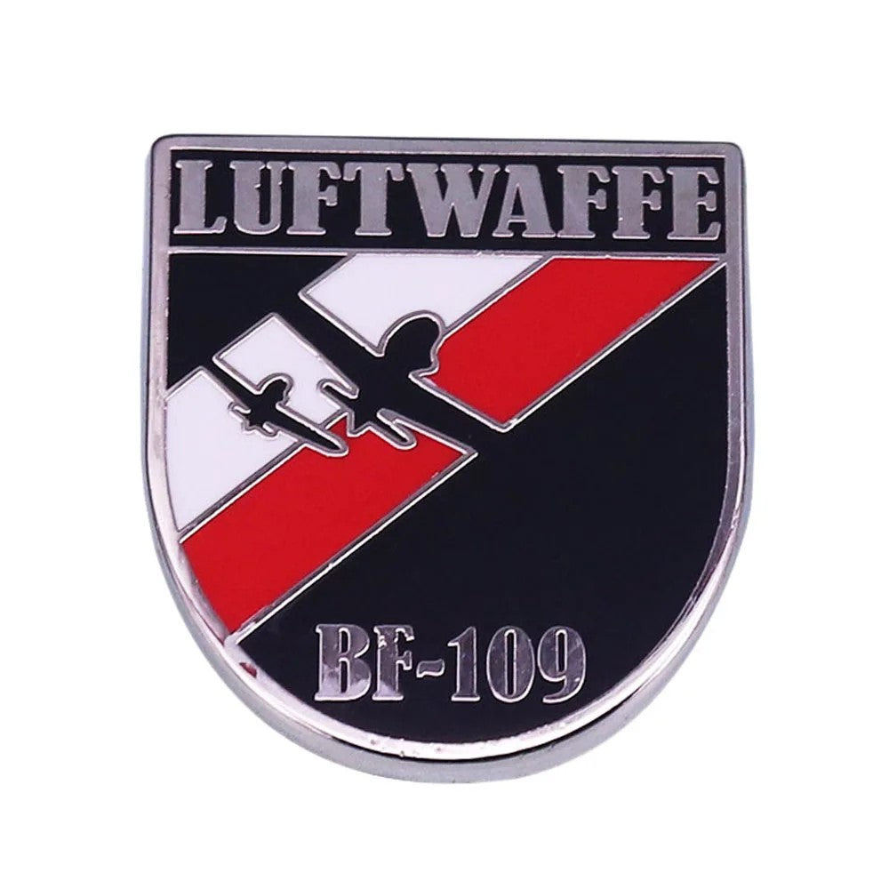 German Luftwaffe badges metal BF109 shield badge with LUFTWAFFE lettering red white stripe aircraft silhouette
