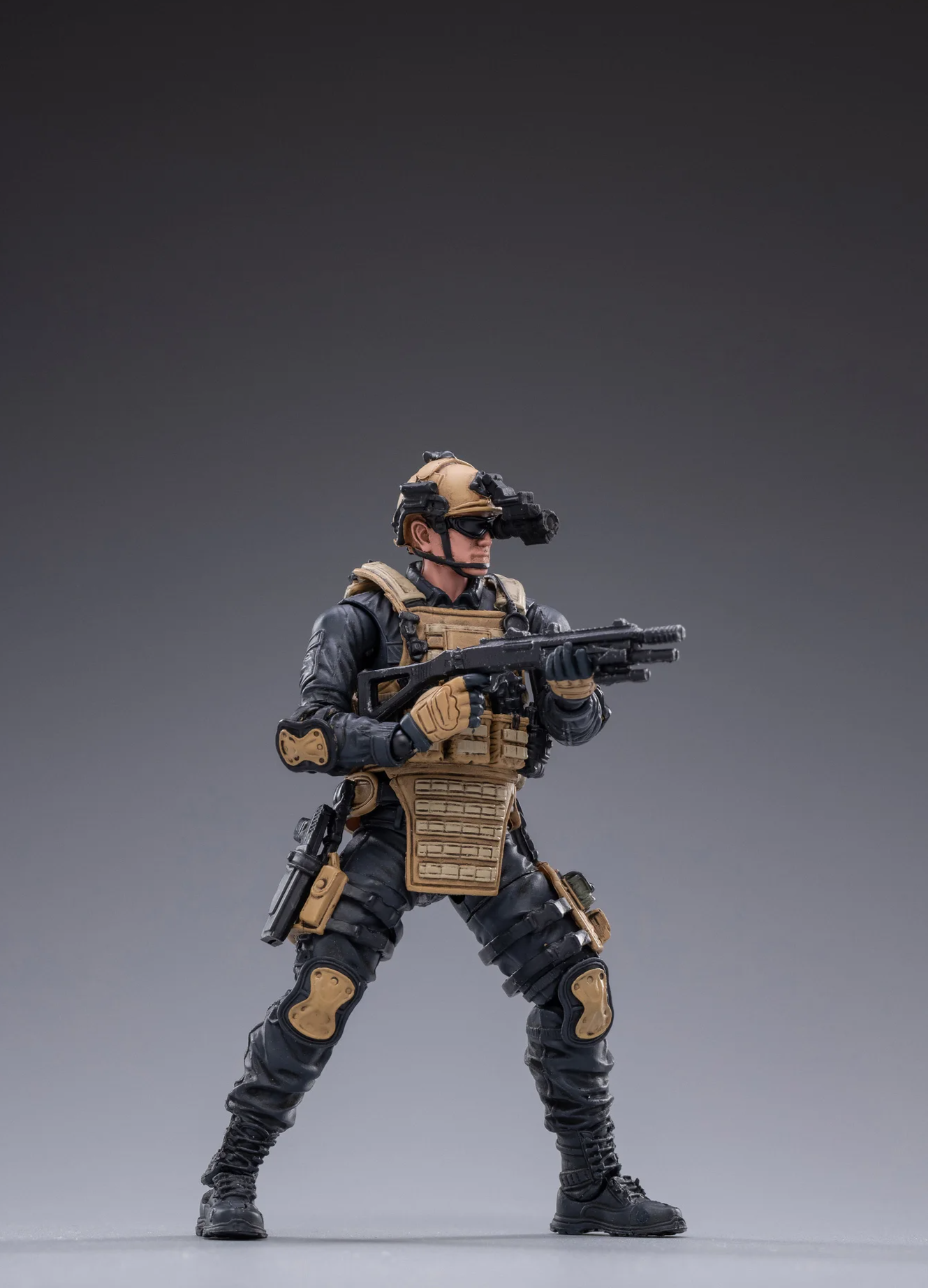 JOYTOY special forces set action figure dressed in tactical gear holding a rifle in combat pose
