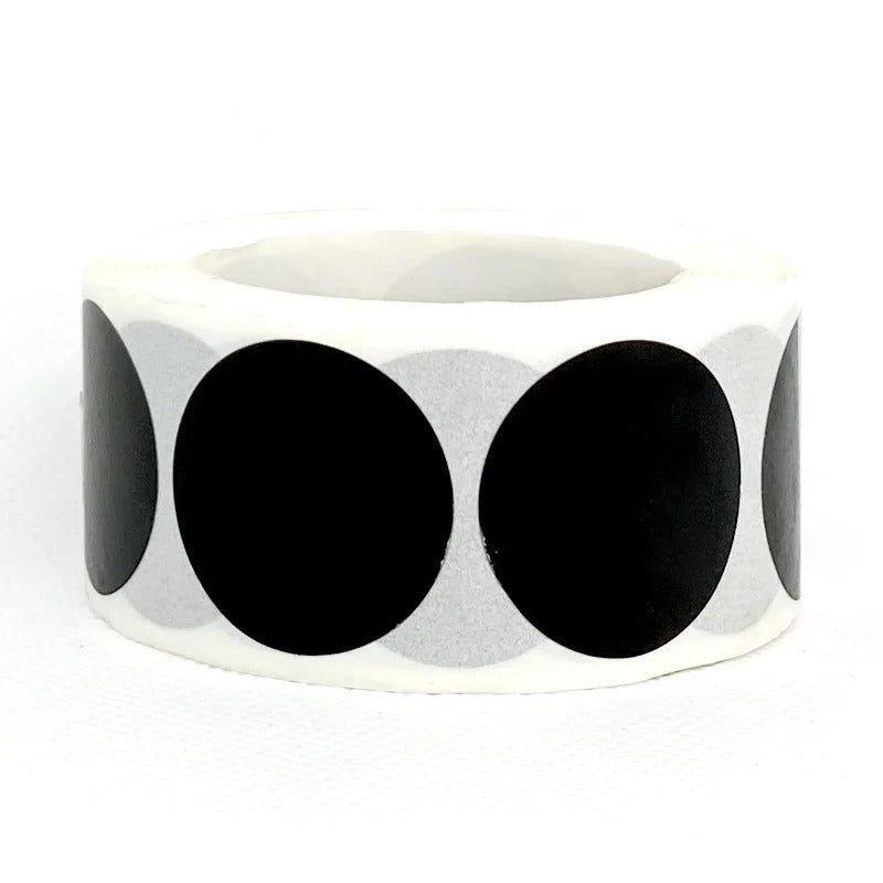 Roll of fluorescent round labels 25mm in black for shooting target marking from Military-Outdoors.com