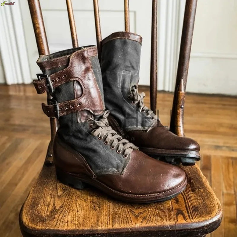 Medieval archery boots from Military-Outdoors.com made of brown leather and dark fabric with laces and buckle straps