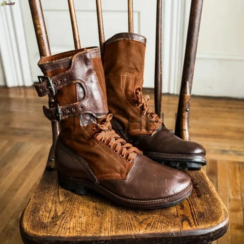 Brown leather medieval archery boots with laces and buckle straps for outdoor use