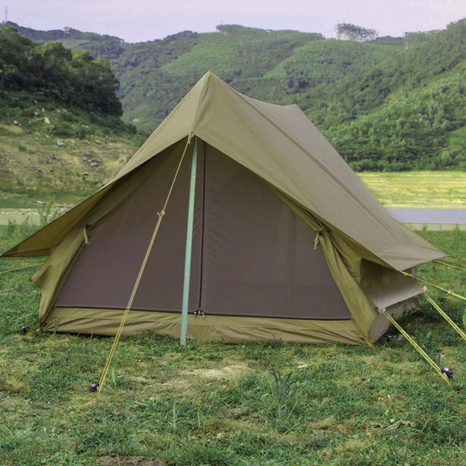 Olive drab military camping tent A frame with mesh front center pole and guylines pitched on grass