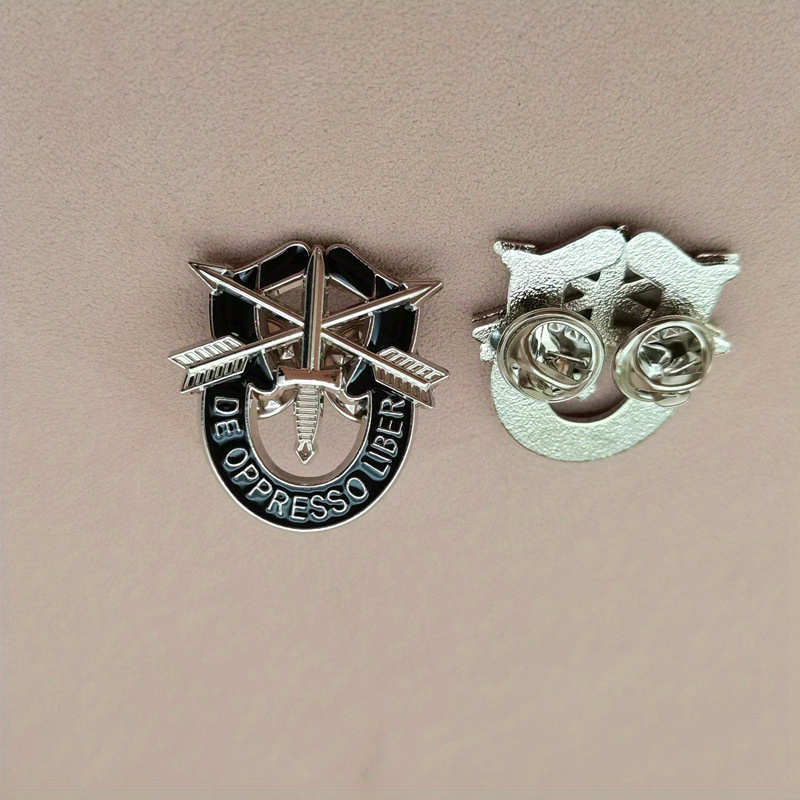 US Army pin with crossed arrows and dagger design from Military-Outdoors.com showing front and back views
