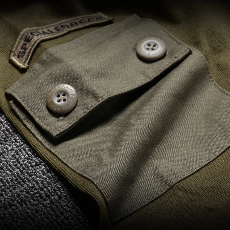 Detail of US Navy combat t-shirt featuring buttons and durable fabric for tactical use