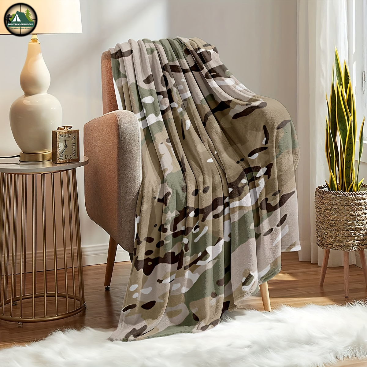 Camouflage flannel blanket draped over a beige armchair in a cozy living room setting
