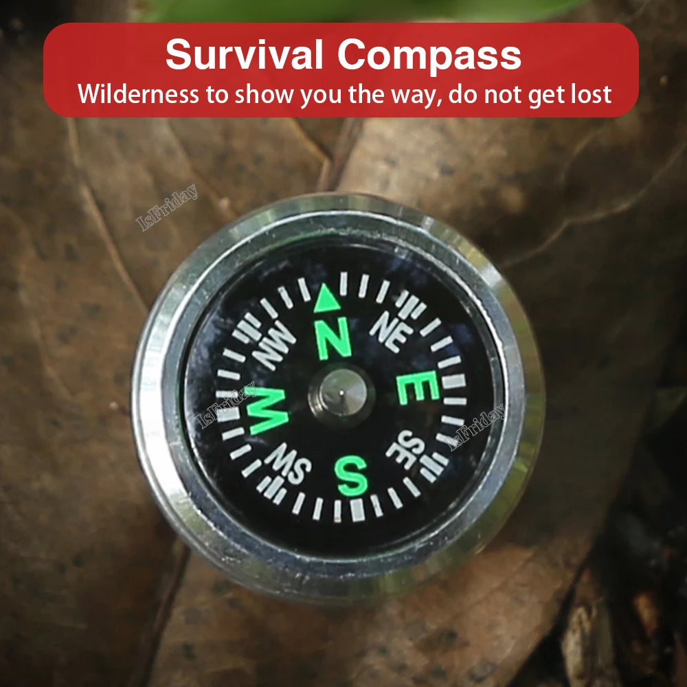 folding military shovel with built in survival compass close up showing luminous needle and markings