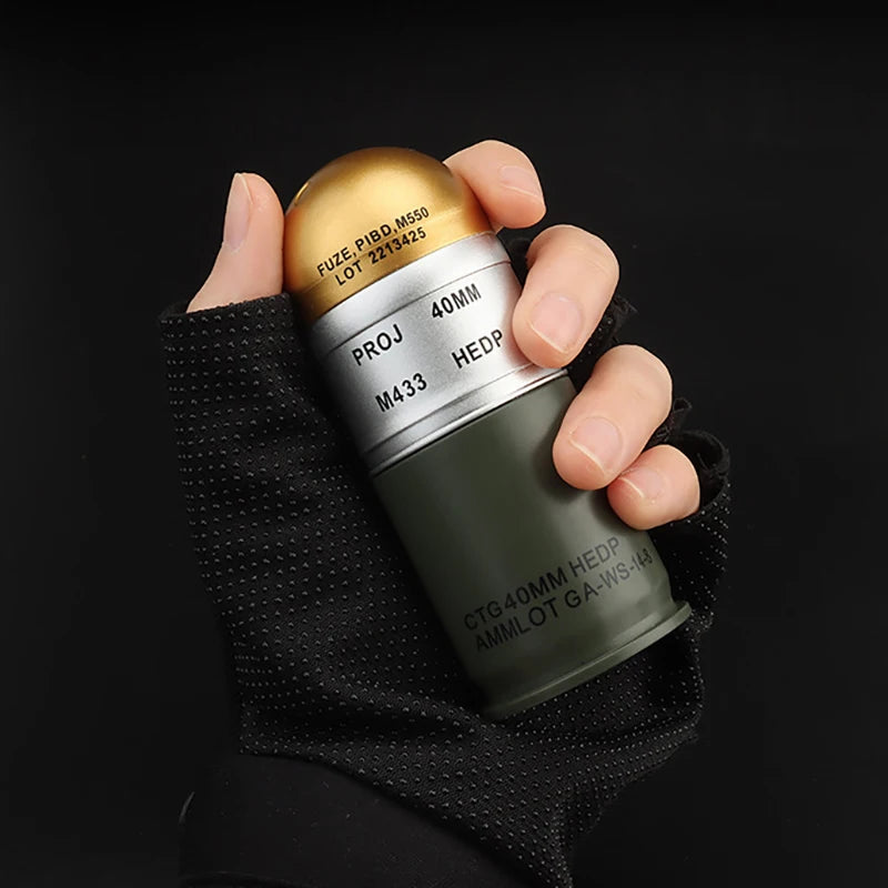 Military Outdoors replica 40mm grenade in gloved hand Dummy Grenade Model olive green silver gold finish realistic training prop