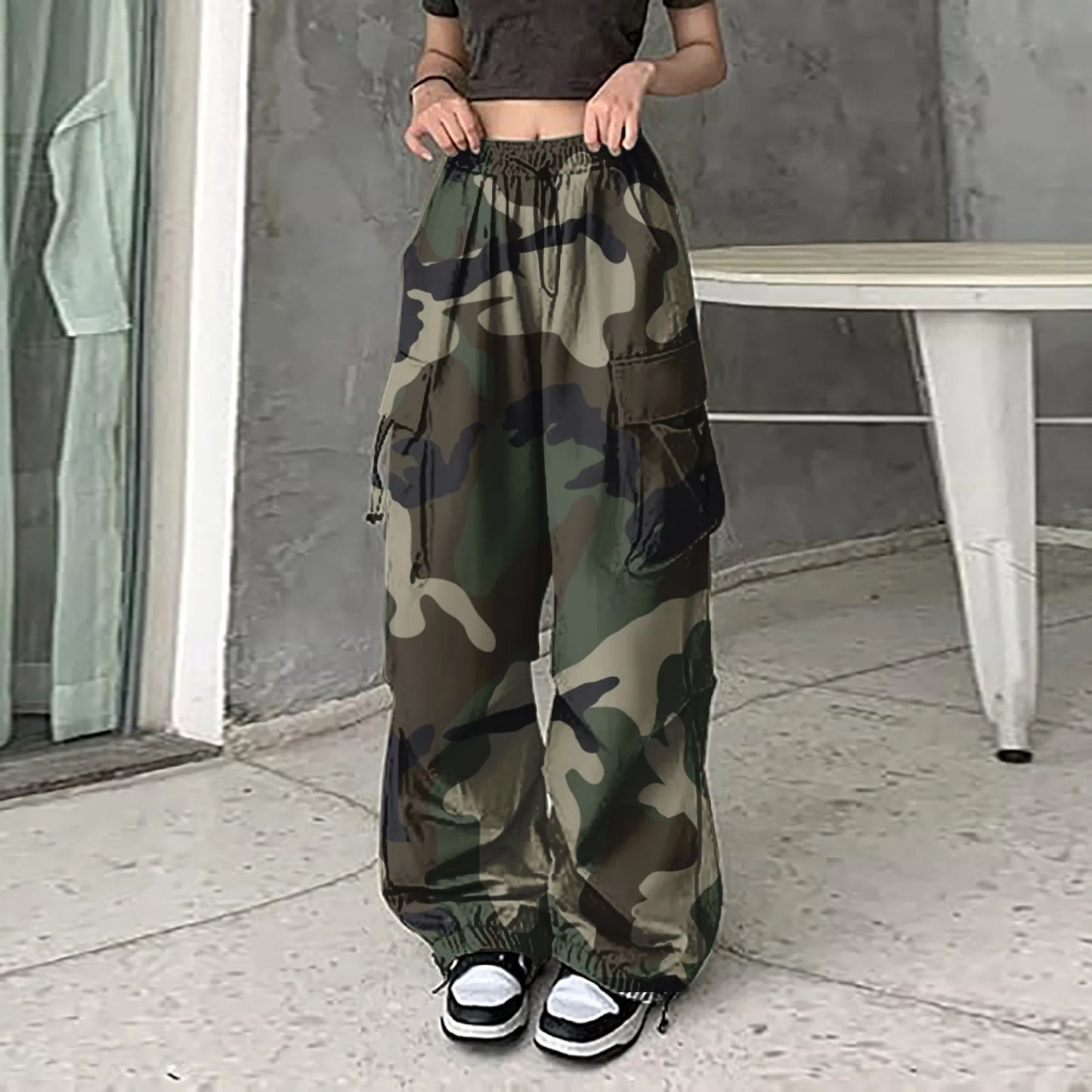 Vintage camouflage cargo pants for women with loose fit and multiple pockets