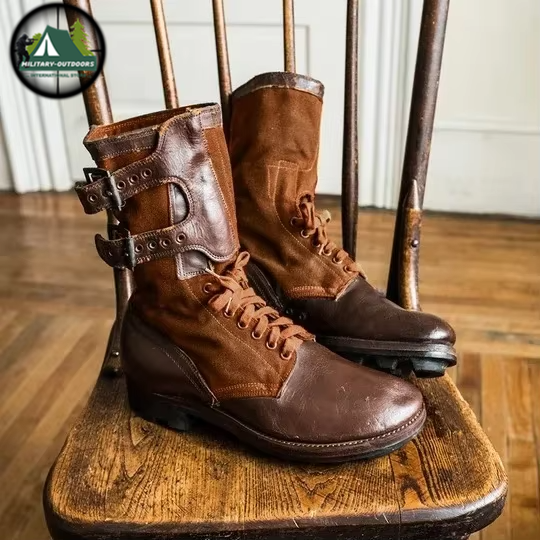 Brown leather and fabric medieval archery boots with laces and buckles on a wooden chair